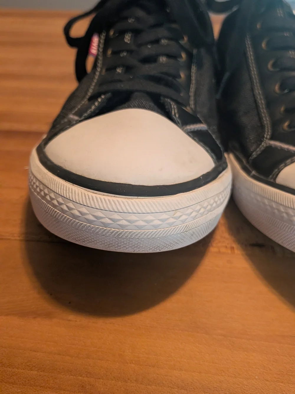 Levi's Black Canvas Low-Top Sneakers with White Toe Cap